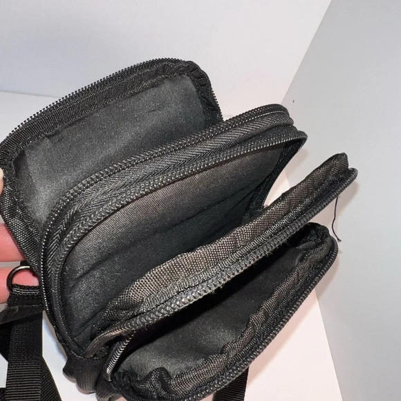 SBS, adjustable, Crossbody, 3 zip compartment, one pouch, belt loop and back 5x8 - Picture 5 of 10